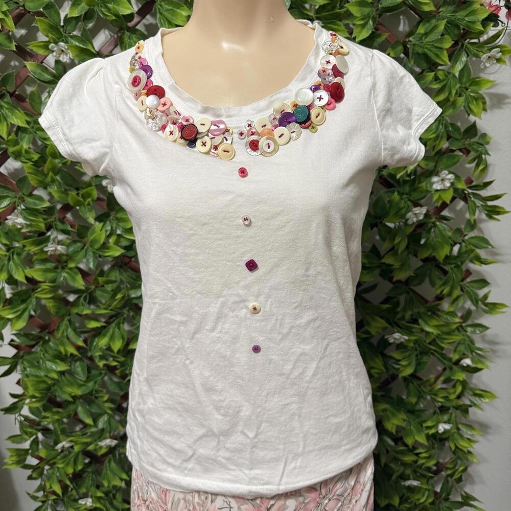 Chic White T-Shirt with Colorful Button Accents